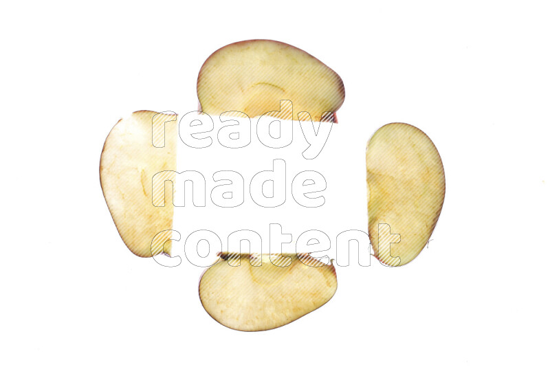 Apple slices on illuminated white background