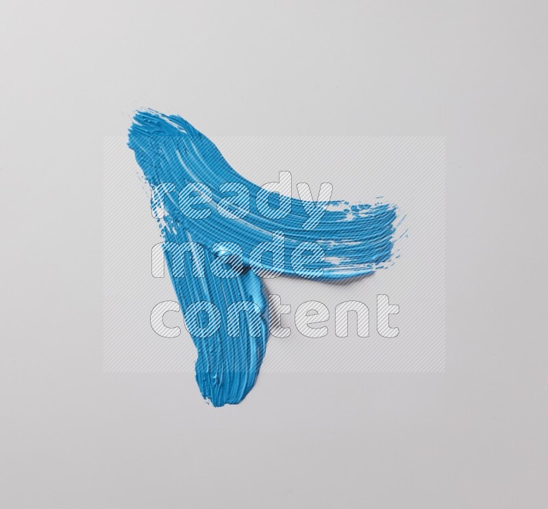 Multi blue curved brush strokes shaped into different shapes on a white background
