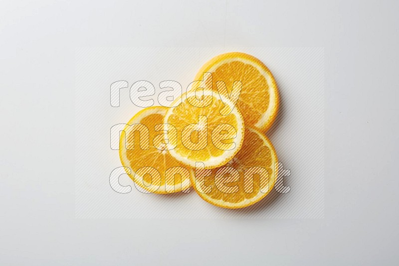 Four orange slices on a white background