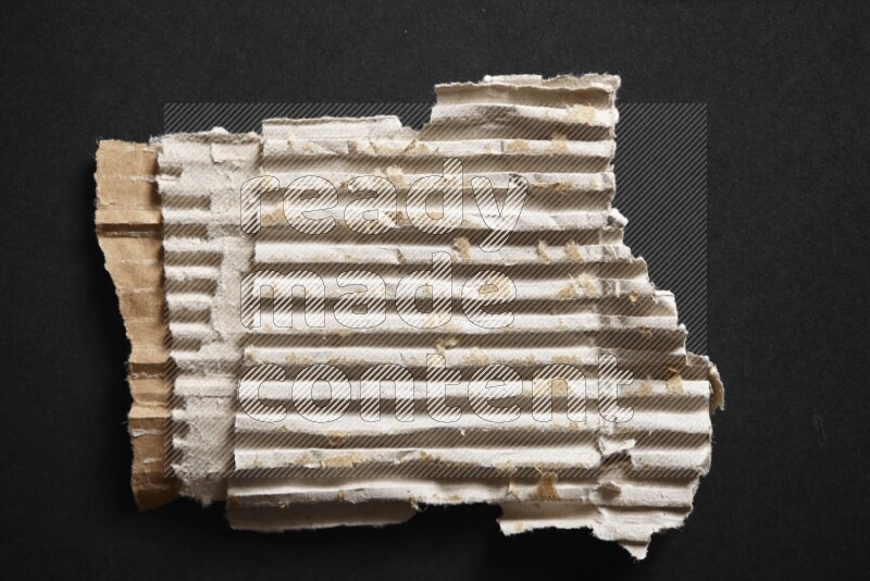 Cardboard on black background