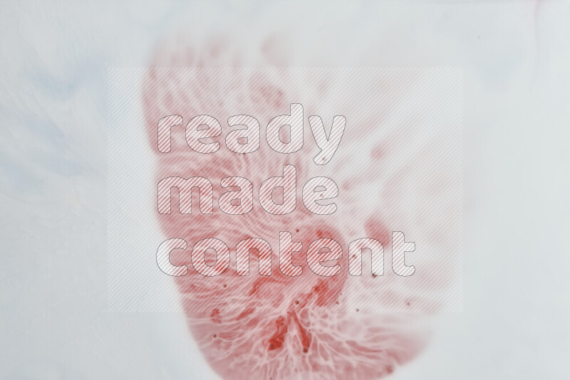 لقطة مقربة لأنماط دوامية باللون الأحمر والأبيض