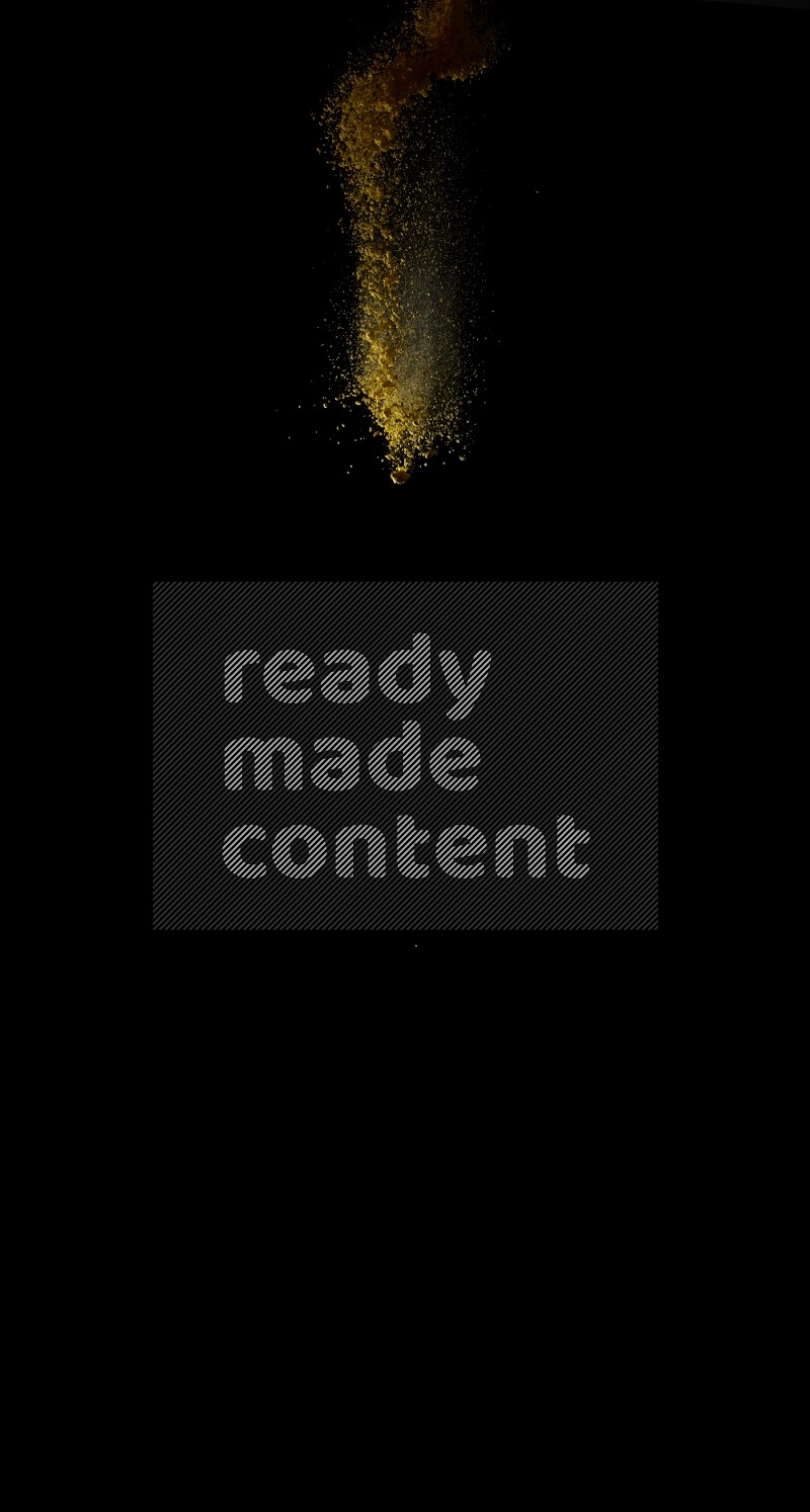A side view of yellow powder explosion on black background