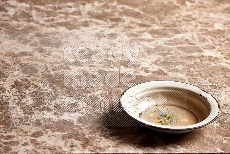 Vintage Metal Plate on Beige Marble Flooring, 45 degrees