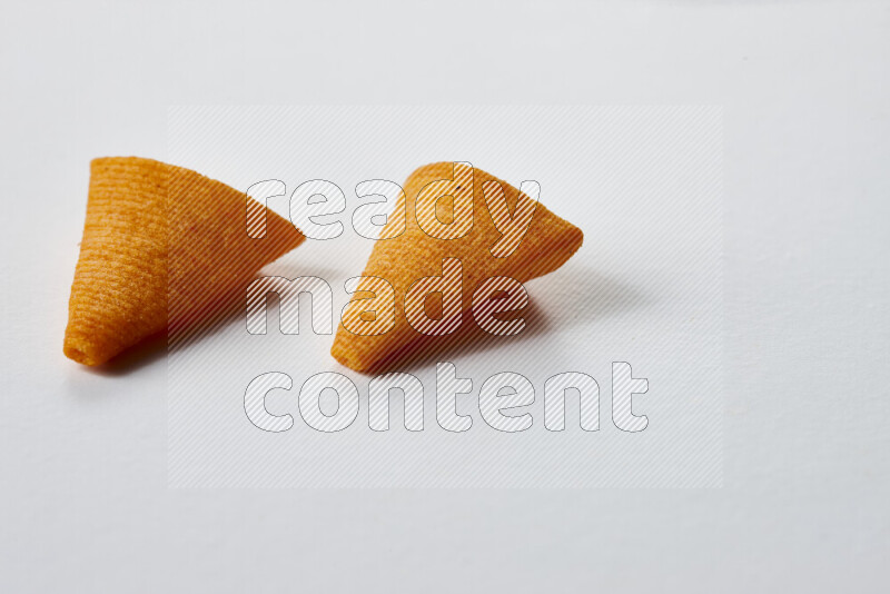 Assorted snacks on white background
