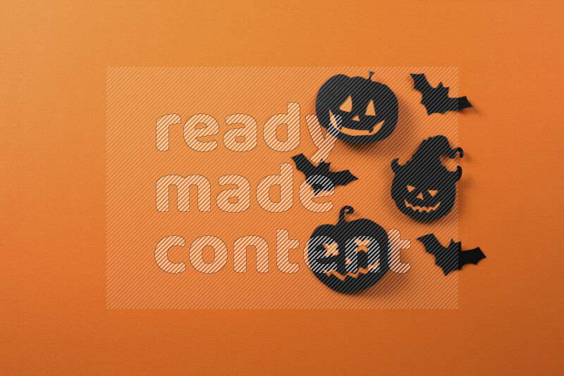 Halloween hand crafts on orange background