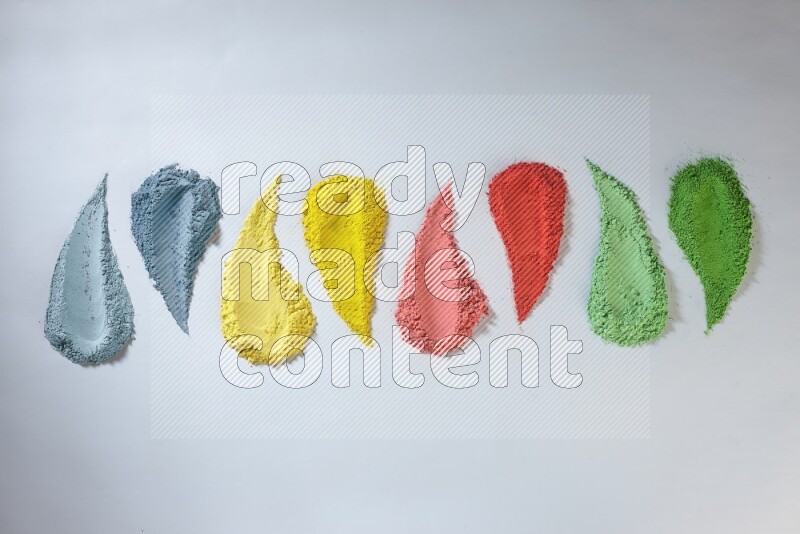Multicolored powder strokes on white background