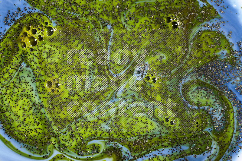 لقطة مقربة لبريق ذهبي متلألئ منتشر على خلفية من اللون الأزرق والأخضر في حركات دائرية