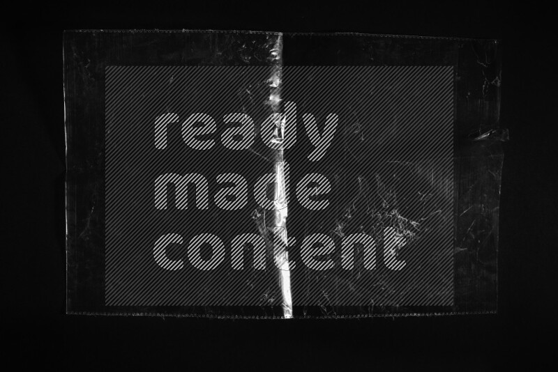 Transparent plastic textures on black background