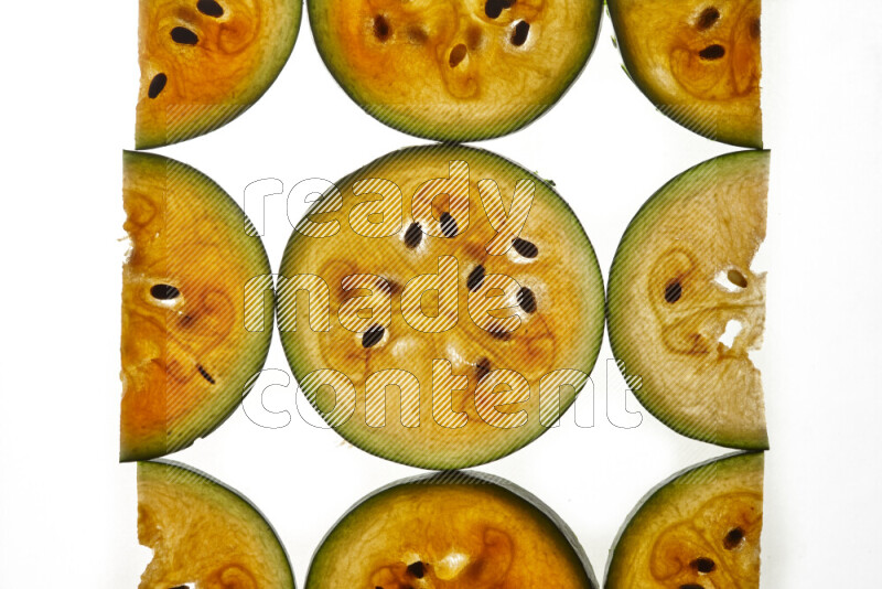 Watermelon slices on illuminated white background