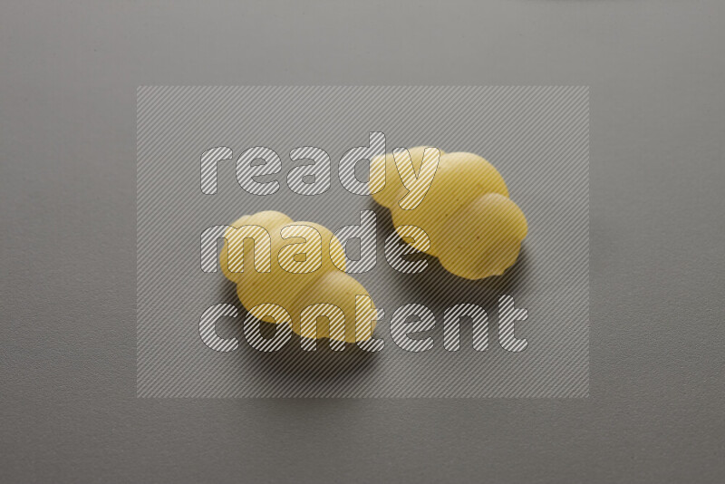 Snails pasta on grey background