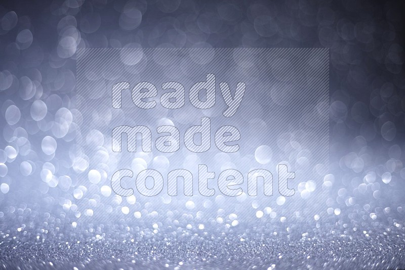 Silver glittery bokeh background