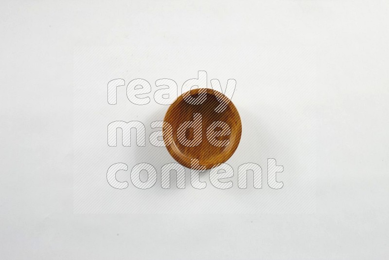A wooden bowl on white background