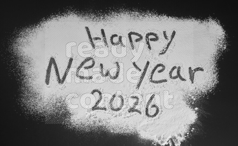 A sentence written with powder on black background