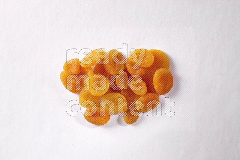 Dried apricots on white background