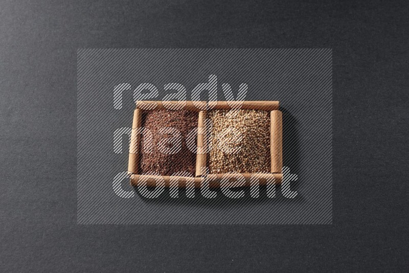 2 squares of cinnamon sticks full of mustard seeds and garden cress on black flooring