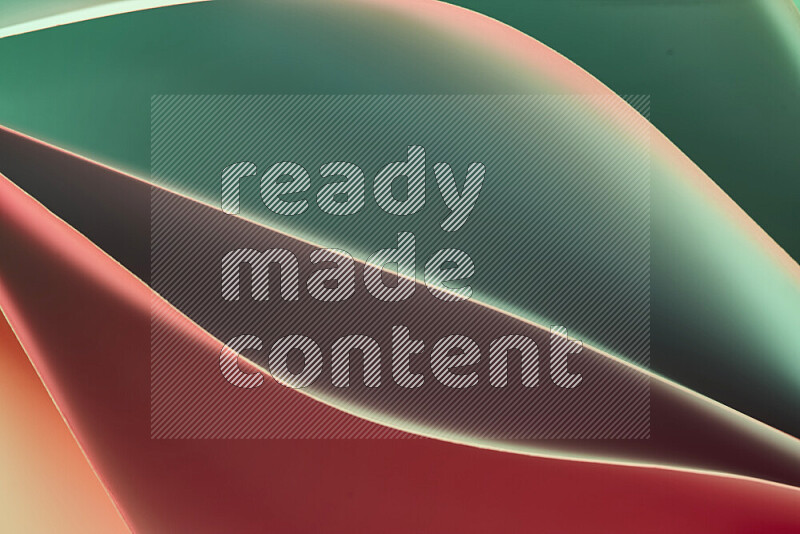 This image showcases an abstract paper art composition with paper curves in green and red gradients created by colored light