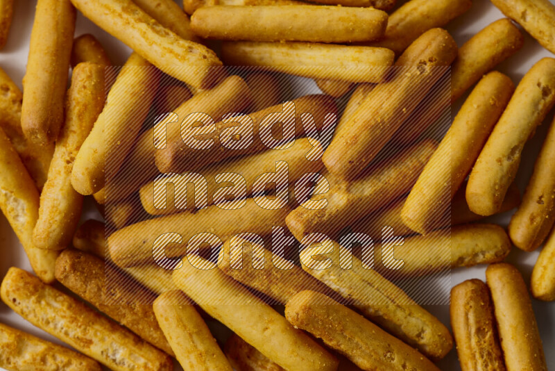 Assorted snacks on white background