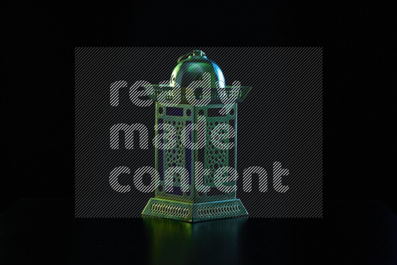 Ramadan lanterns with colored rim light against black background