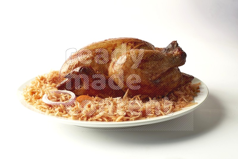 red basmati Rice with  whole roasted chicken on a white rounded plate  direct  on white background