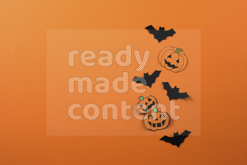 Halloween hand crafts on orange background