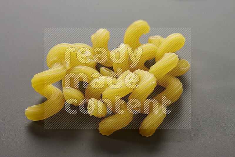 Twist pasta on grey background