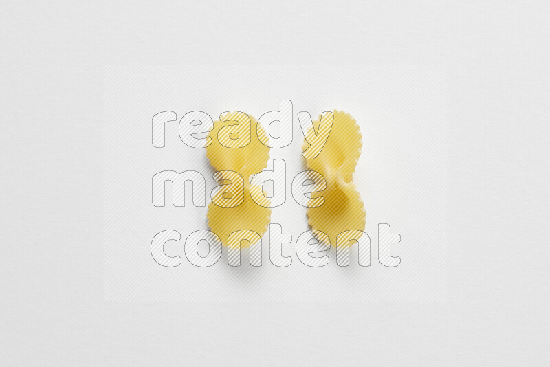 Fiocchi pasta on white background