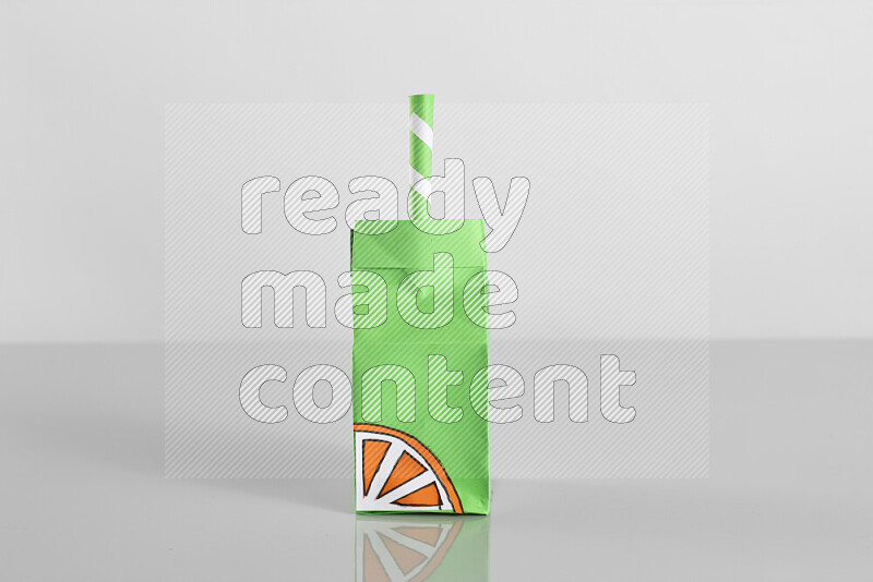 Origami juice box on grey background