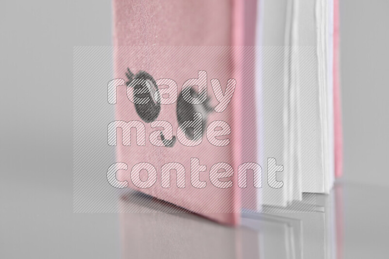 Origami book on grey background