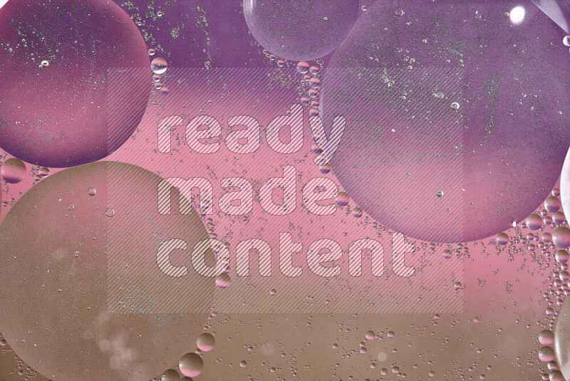 Close-ups of abstract oil bubbles on water surface in shades of brown, purple and pink