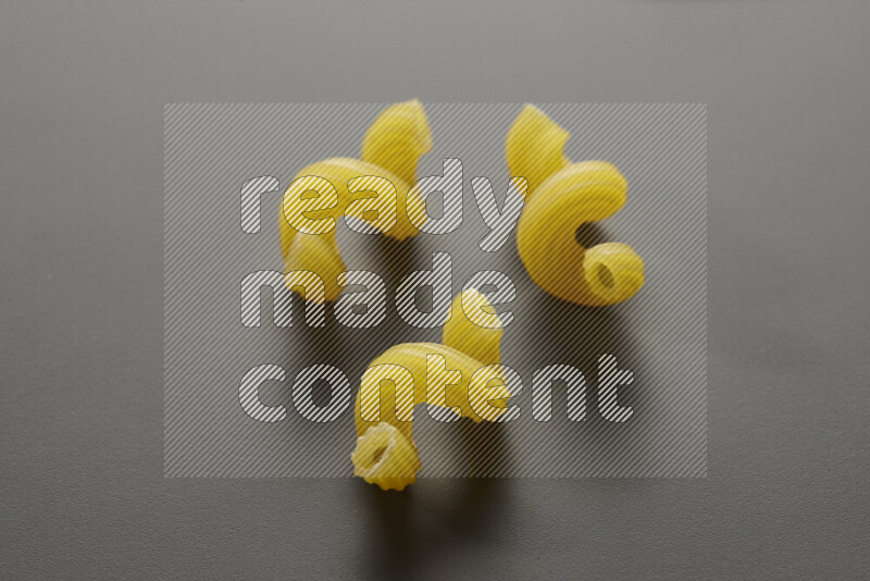 Twist pasta on grey background