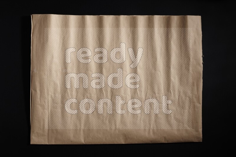 Craft paper on black background