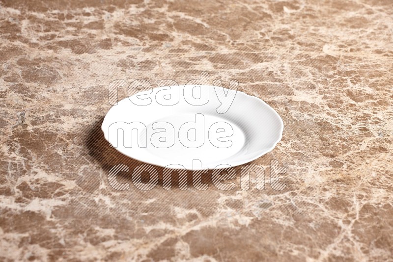 White Ceramic Circular Plate on Beige Marble Flooring, 45 degrees