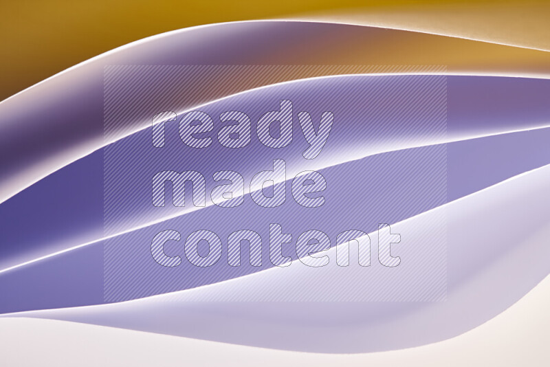 This image showcases an abstract paper art composition with paper curves in white and different warm gradients created by colored light