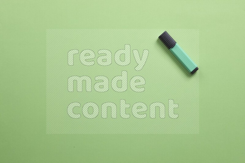 Multicolored highlighter pens on green background