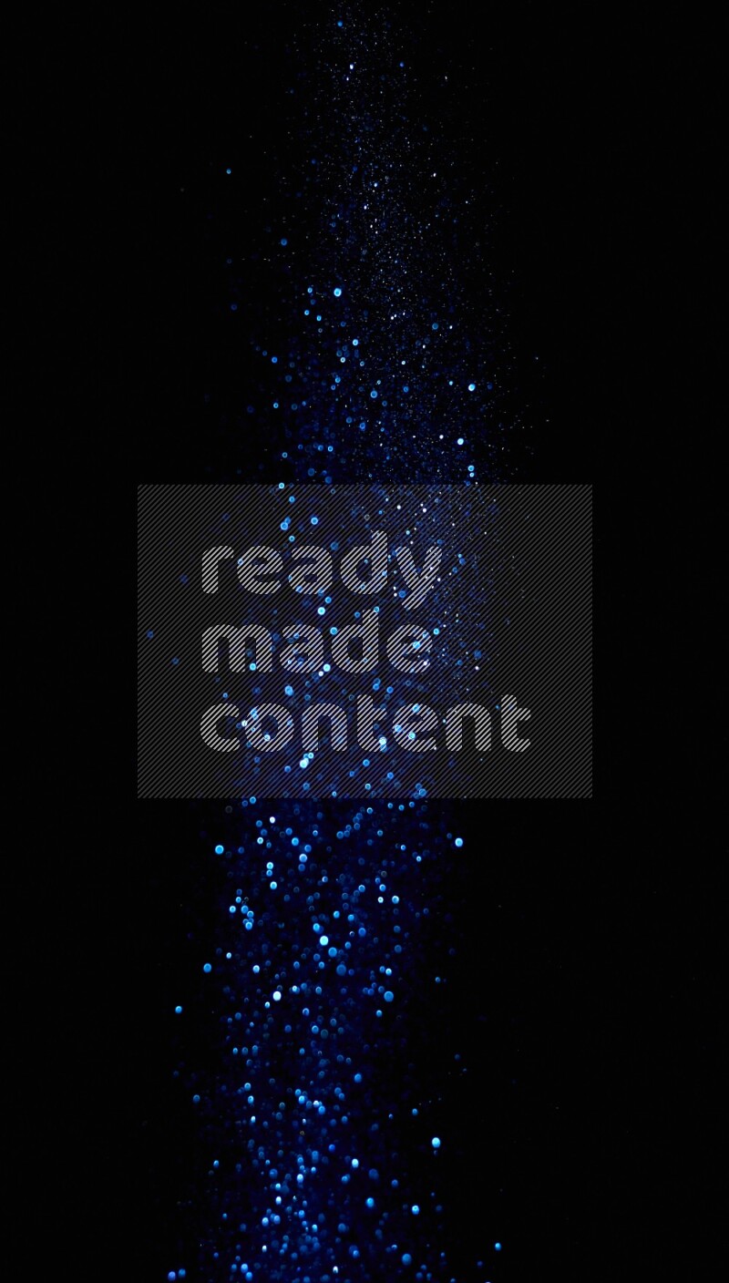 Blue glitter powder isolated on black background