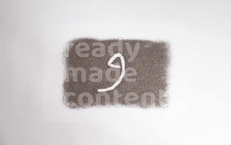 Arabic alphabets written with glitter on white background