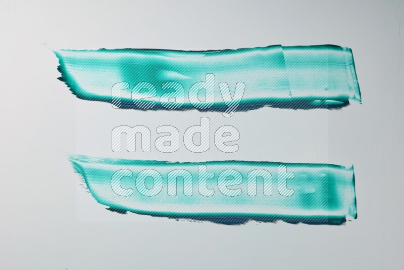 Turquoise painting knife strokes on white background