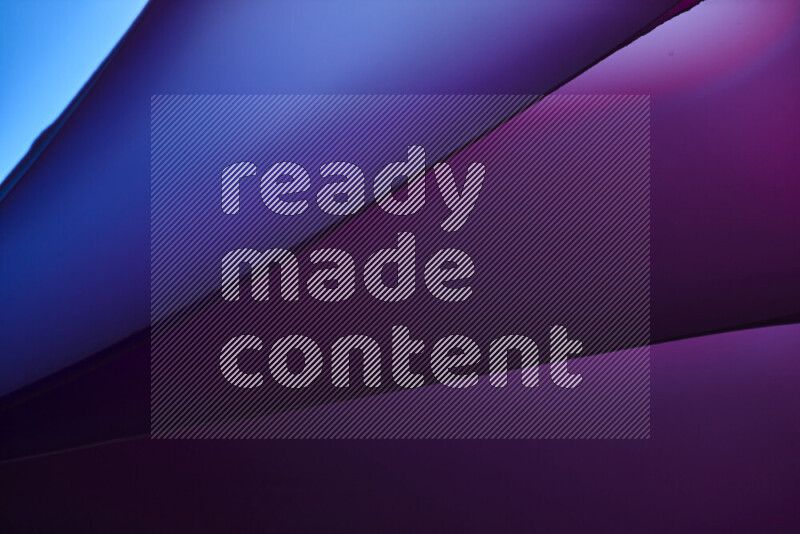 An abstract art piece displaying smooth curves in warm and cold gradients created by colored light