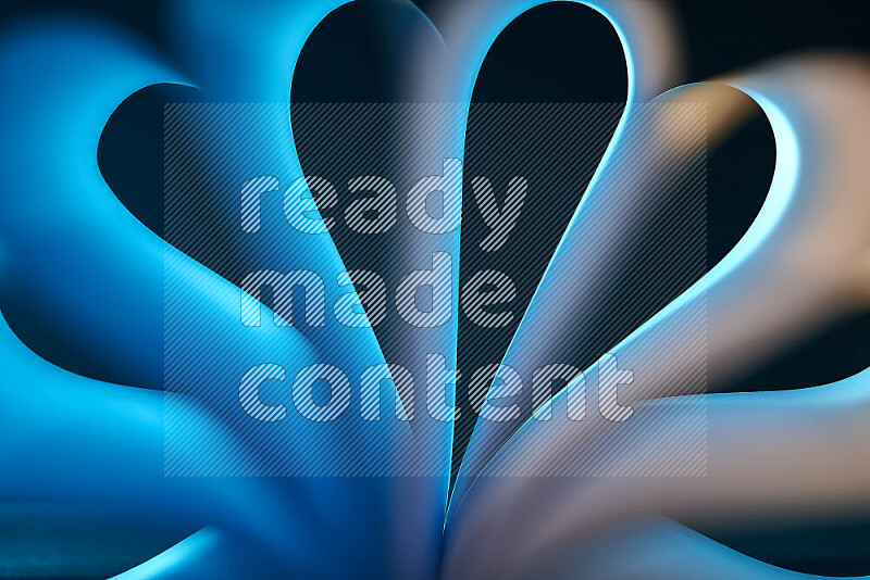 An abstract art piece displaying smooth curves in blue and orange gradients created by colored light