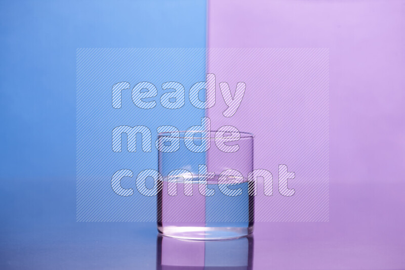 The image features a clear glassware filled with water, set against blue and light purple background