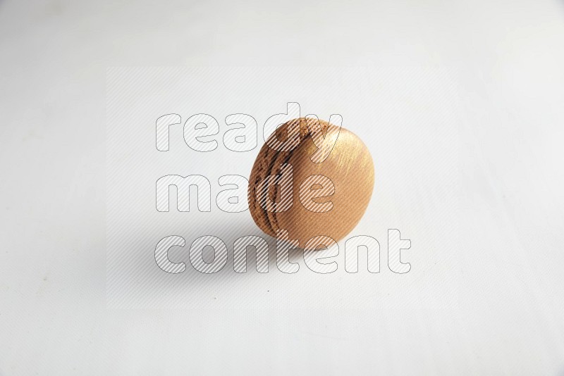 45º Shot of Brown Coffee macaron on white background