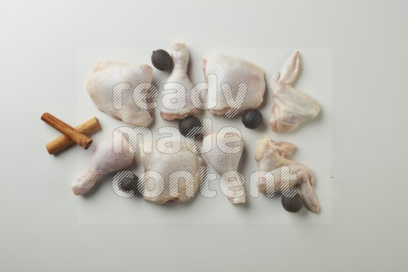 Mixed fresh chicken pieces direct on a white background