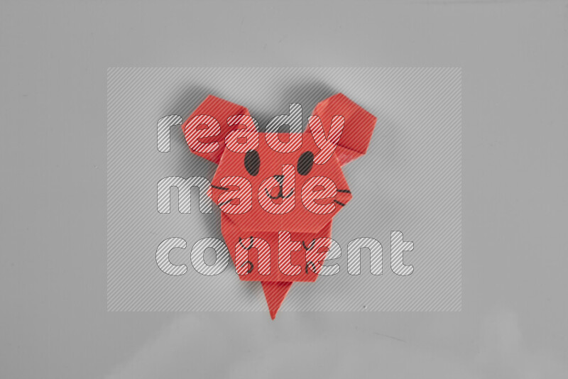 Origami animals on grey background