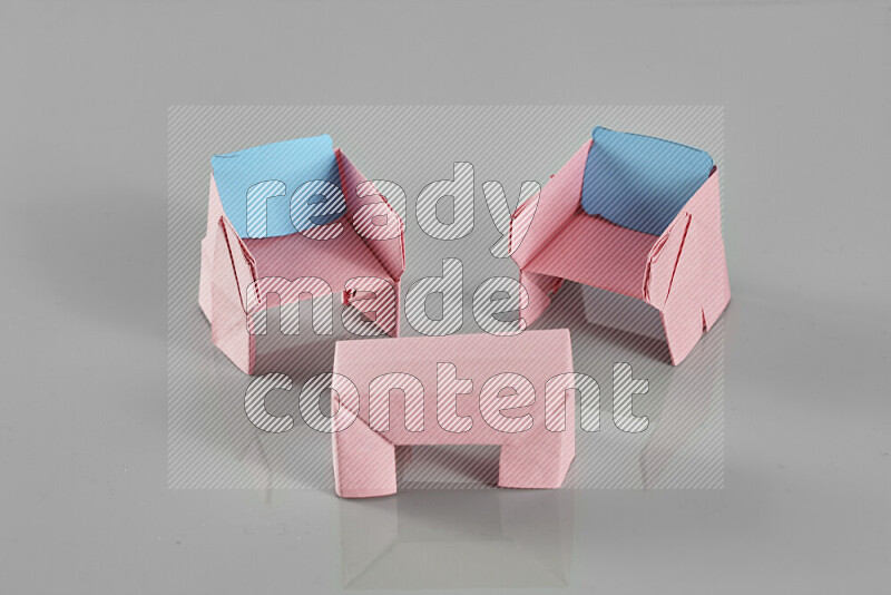 Origami living room on grey background