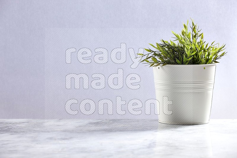 Artificial Plant in White pot on Light Grey Marble Flooring 15 degree angle