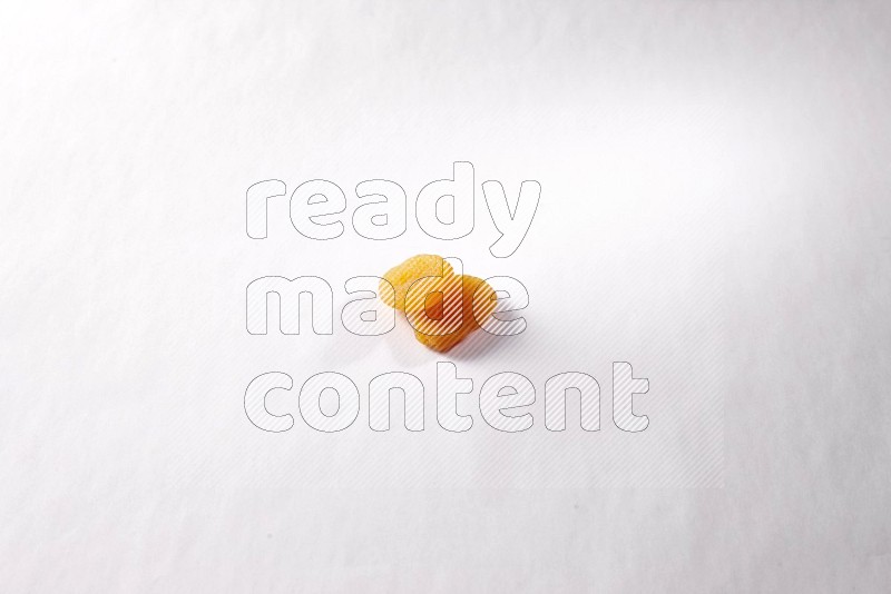 Dried apricots on white background