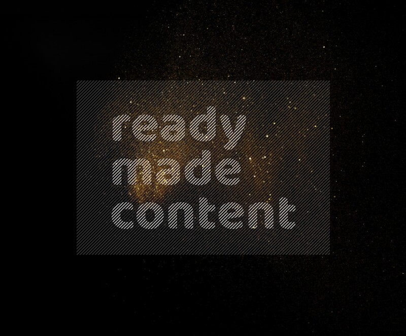 Gold glitter powder isolated on black background