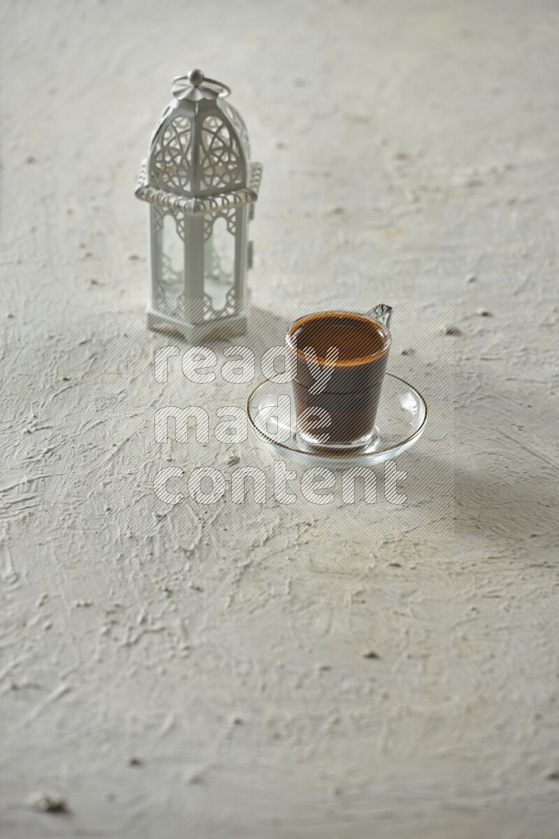 A white lantern with different drinks, dates, nuts, prayer beads and quran on white background