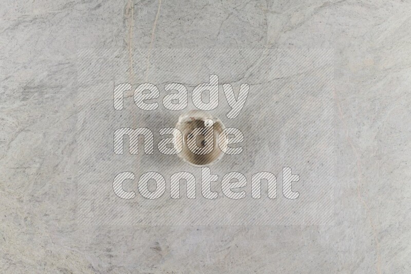 A pottery soap holder on grey marble background