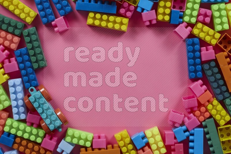 Multicolored plastic building blocks on different backgrounds (kids toys)